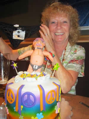 Man Jumping Out of Cake